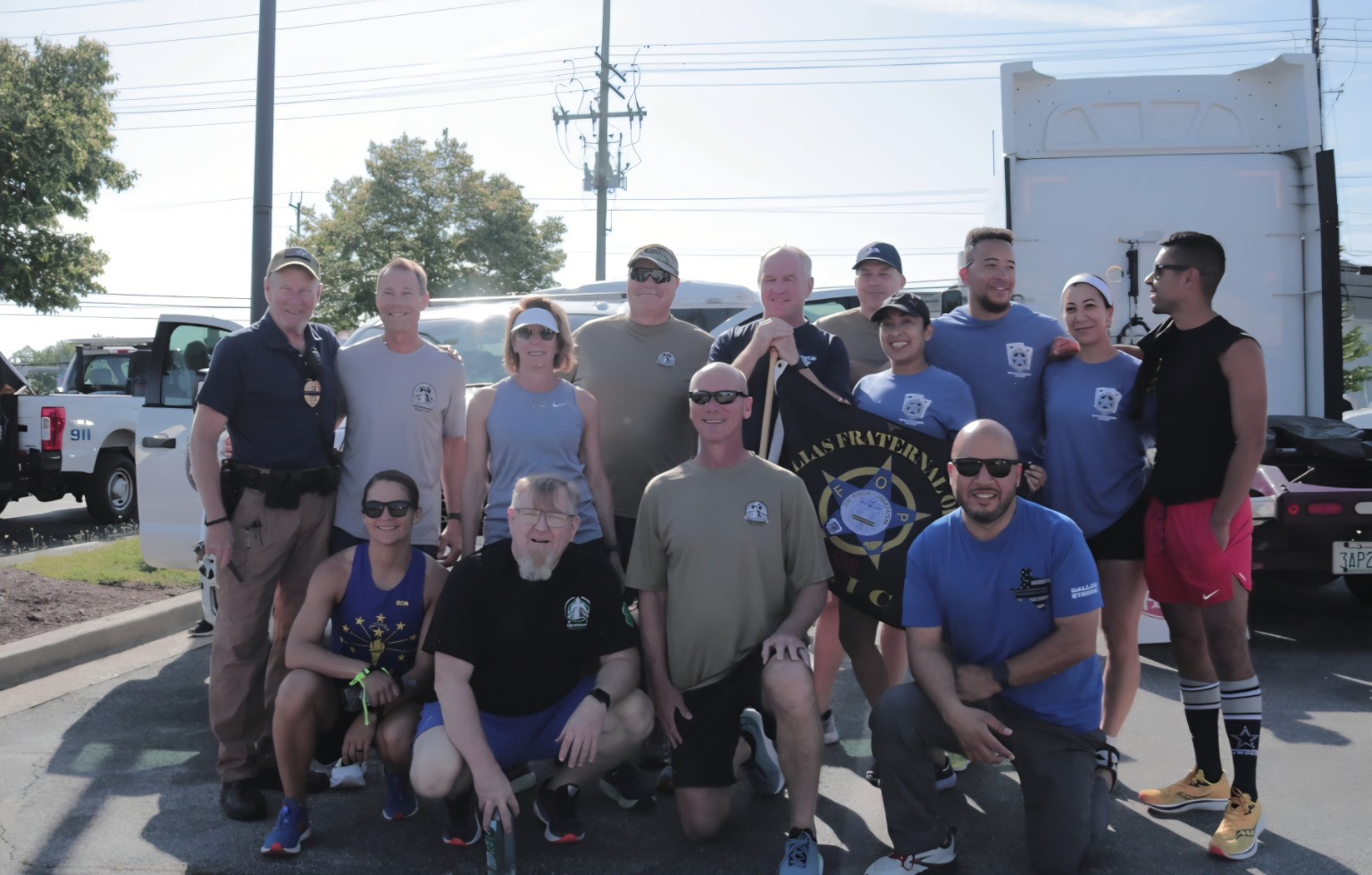 Police Week memorial runners carrying flags