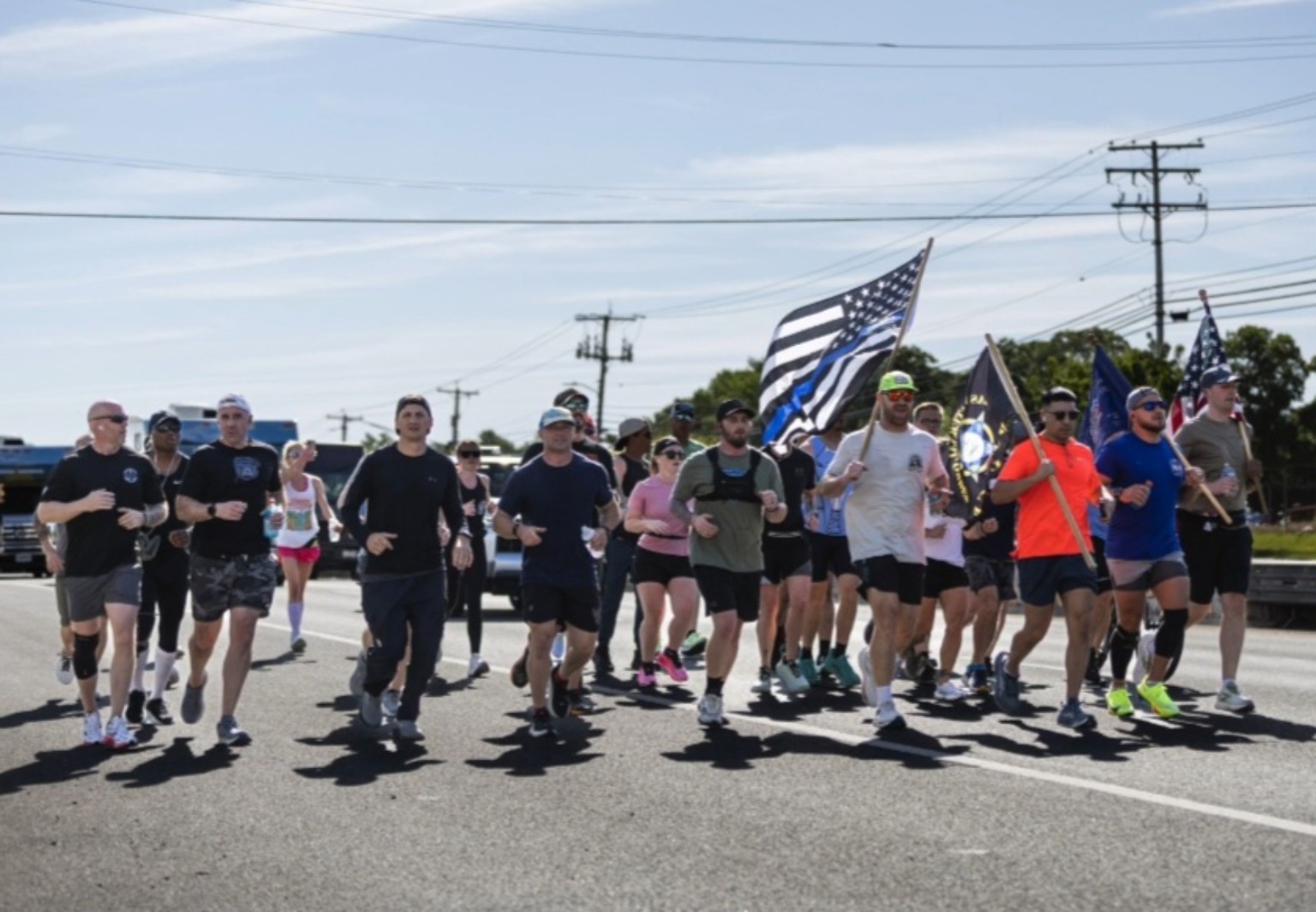 Memorial runner carrying an Indiana flag